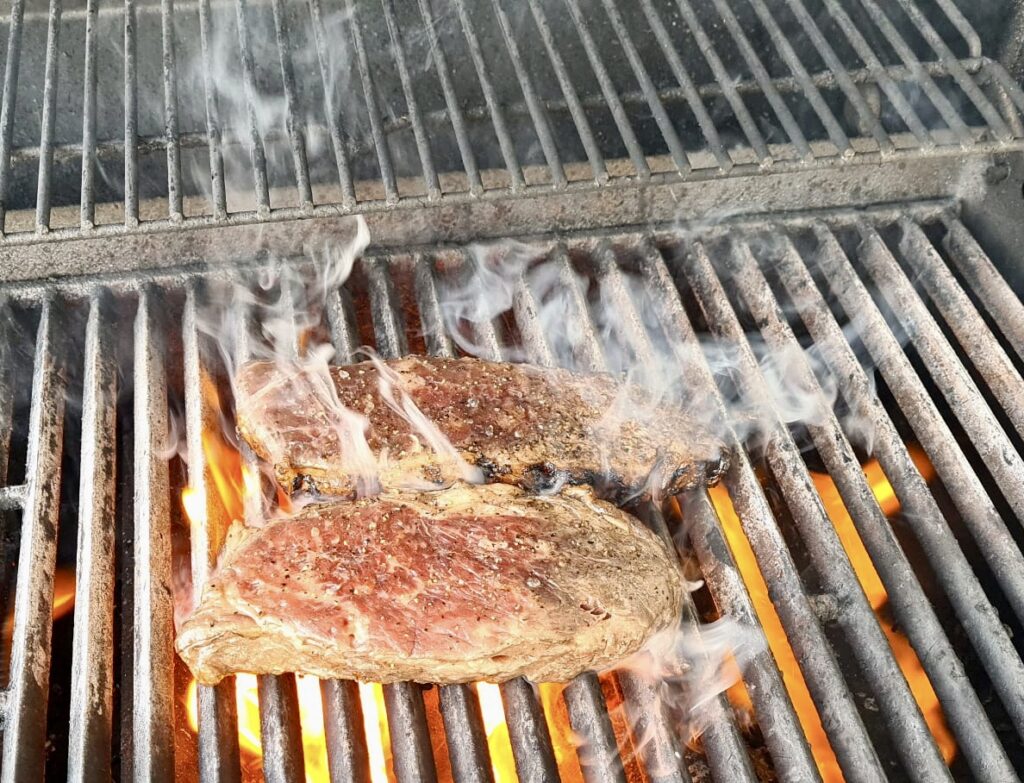 Armandos Canada Prime NY Striploin Steak on BBQ