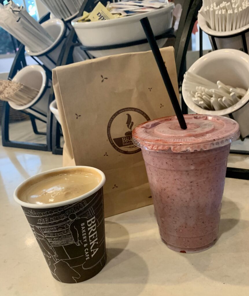 Flat White and Berrylicious Smoothie from Breka Bakery Vancouver