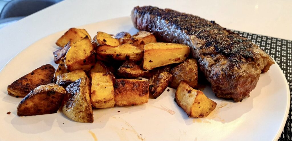 Steaks were served with roasted potatoes from Fresh & Wild Food Market.