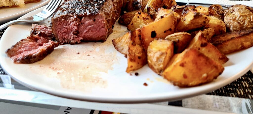 Steaks were served with roasted potatoes from Fresh & Wild Food Market.