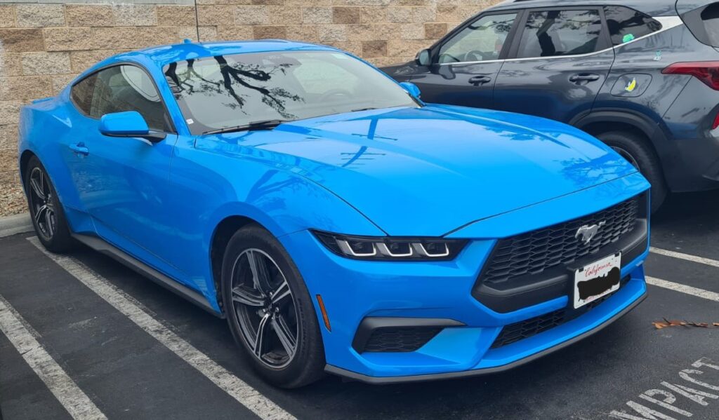 Turquoise Ford Mustang Hertz Car Rental Los Angeles Airport