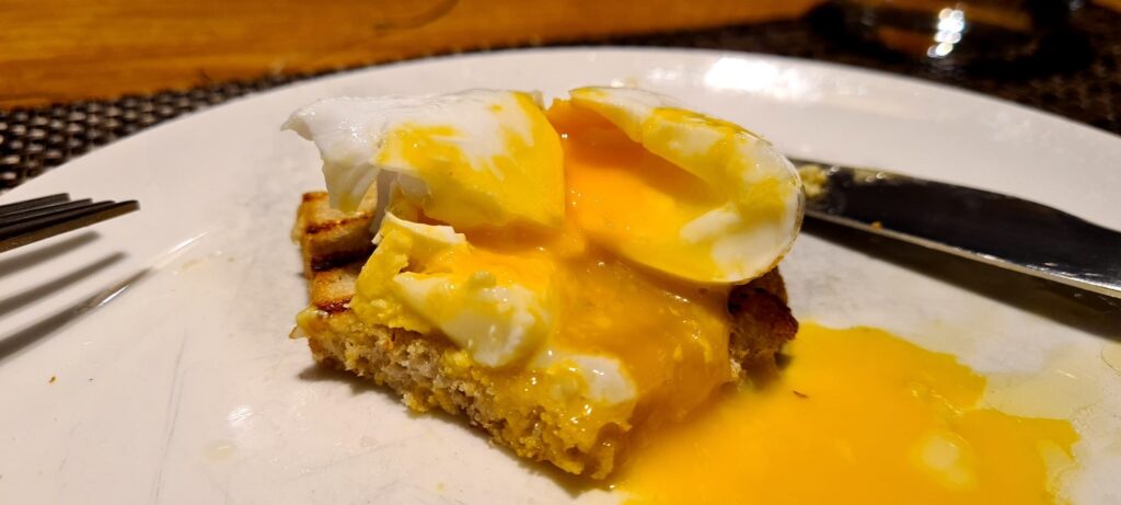 Poached Eggs and Toast at breakfast in Qantas First Lounge Los Angeles Airport