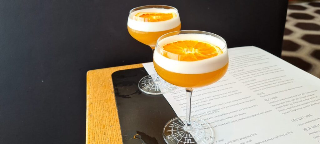 Flying Fox rum cocktail Qantas First Lounge Sydney Airport